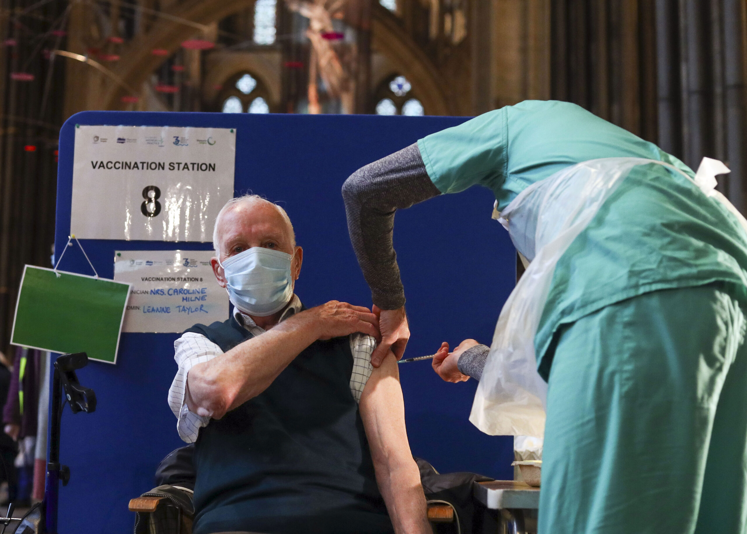 Former RAF Flight Sergeant Louis Godwin receives an injection of the Pfizer coronavirus vaccine at Salisbury Cathedral, Wiltshire. (Photo by Steve Parsons/PA Images via Getty Images)