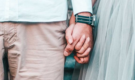 7124-female_male_hold_hands_1200x628-facebook-1200x628